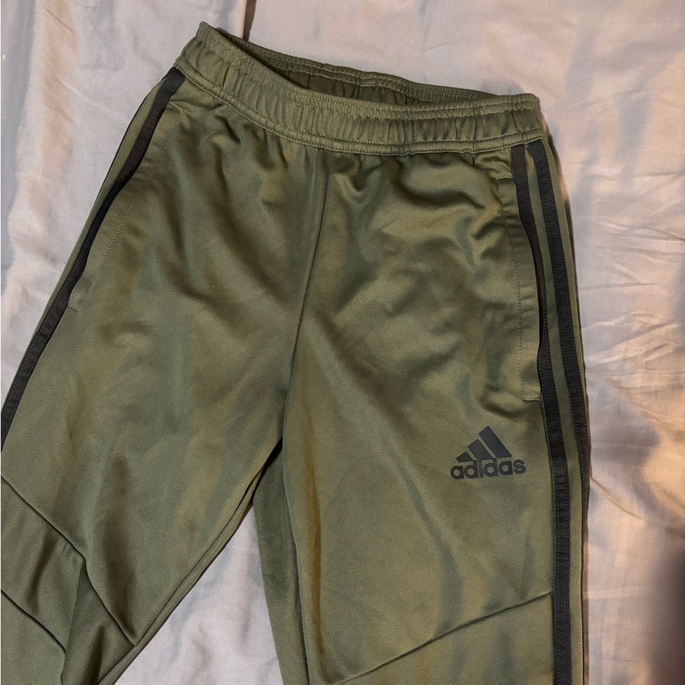 Dark green adidas track pants (slightly high waisted)